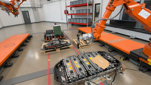 Photo displaying the unscrewing tool of a robotic arm ready for automated dismantling of an electric vehicle battery